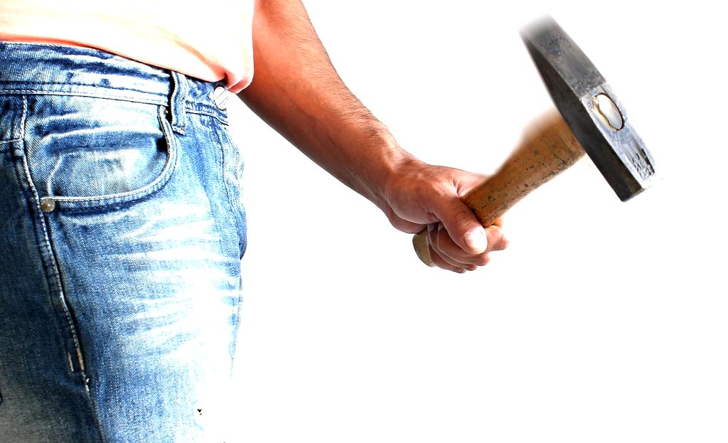 Stack of computer hardware manuals and toolkits